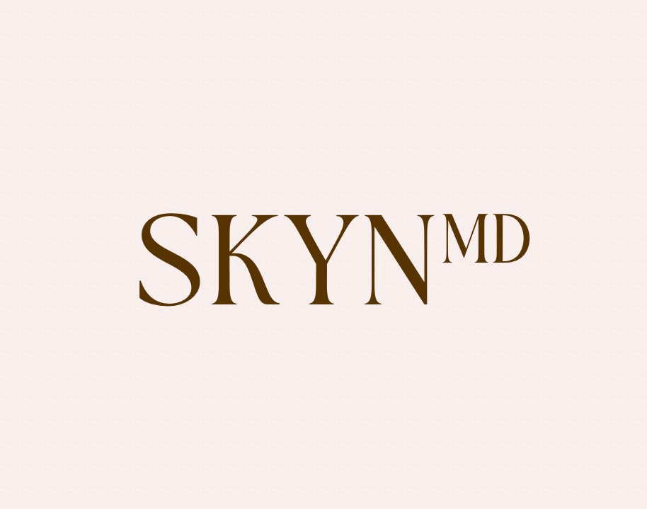 Clean, professional medical spa treatment room with neutral tones at Skyn in Ontario